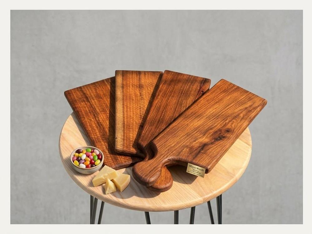 Four long baguette serving boards fanned out