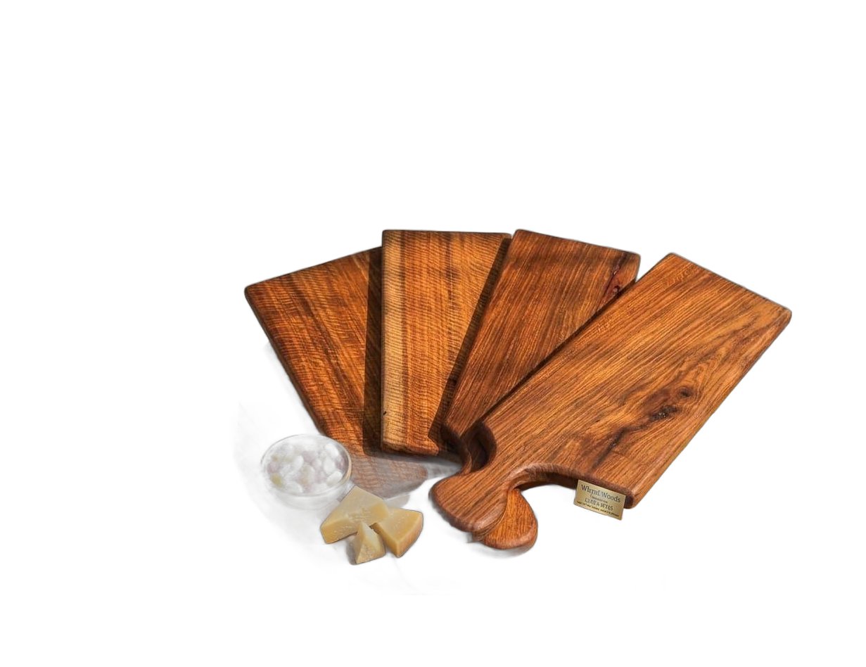 Four blackwood baguette serving boards fanned out, each with a shaped handle