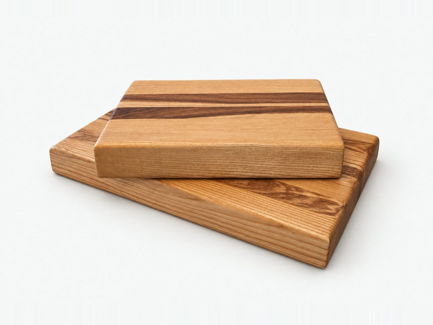 Two thick ash chopping blocks with a contrasting stripe